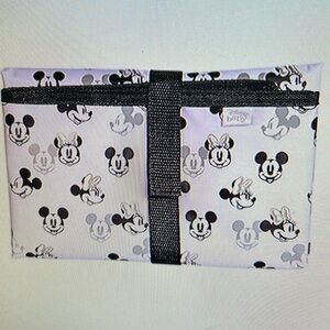 Disney  changing. Pad new in the original package.